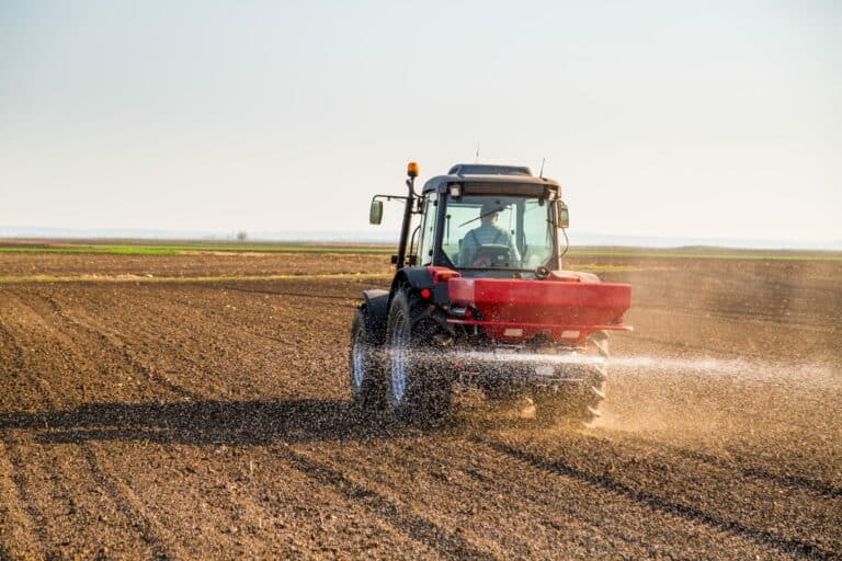 A tractor ploughs a field