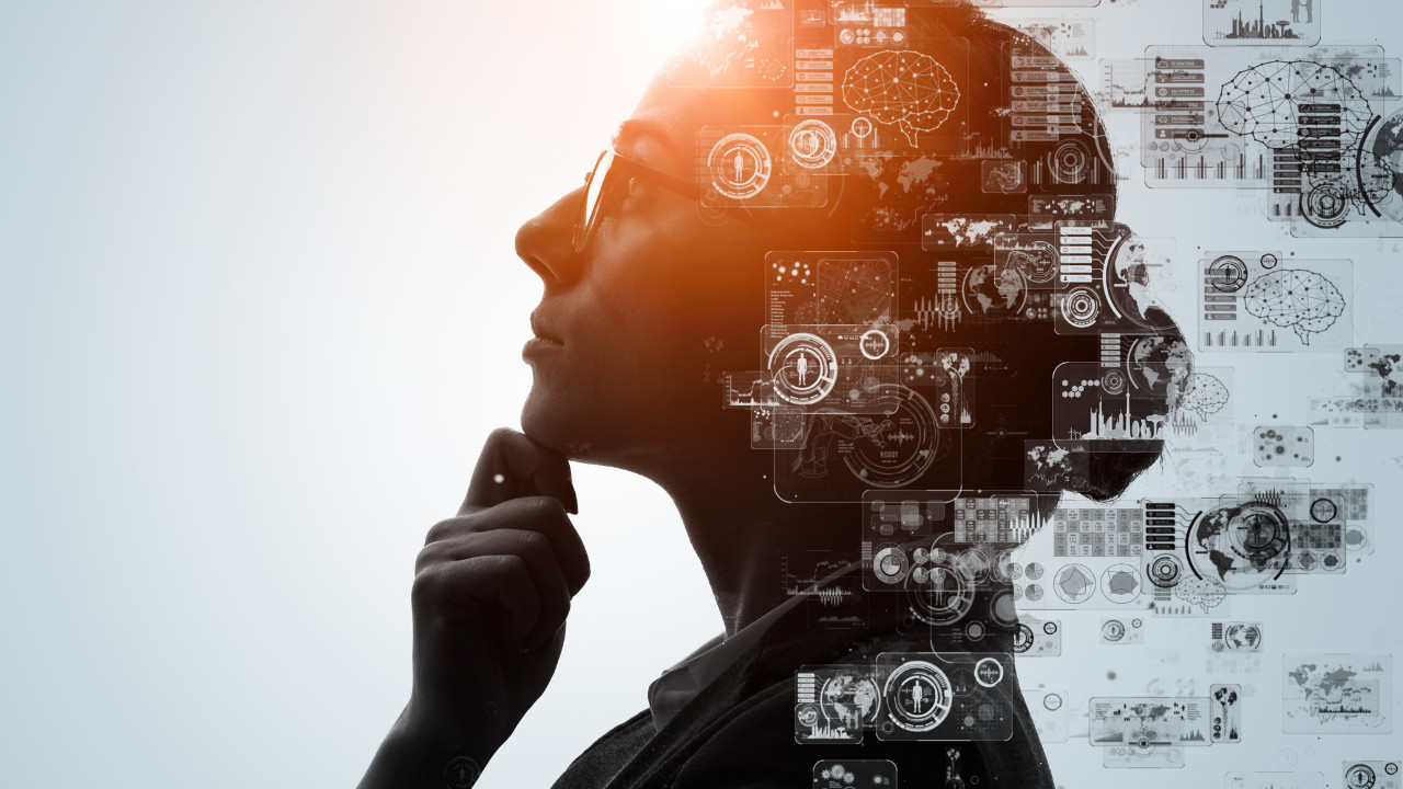 A person in profile wearing glasses thinks, with digital graphics of brain and data icons blending into their head, symbolizing artificial intelligence, innovation, and the pursuit of certification.